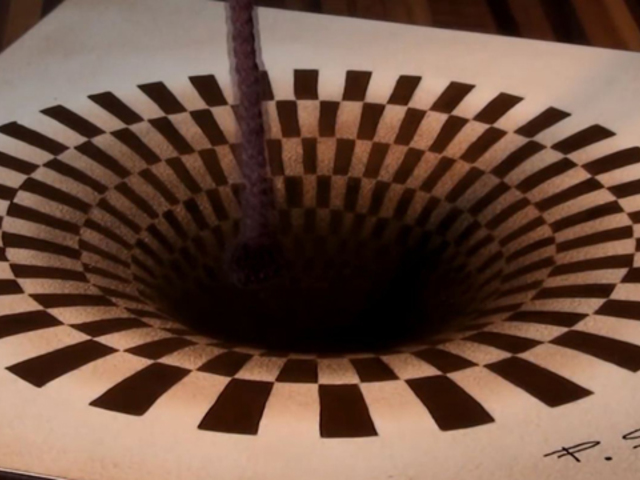 科技趣闻纸上有个大坑其实是拿笔画出来的